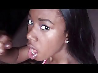 black gal takes massive cumshot to her face.