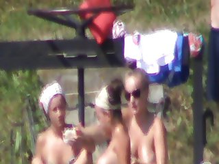 topless teen sunbathing