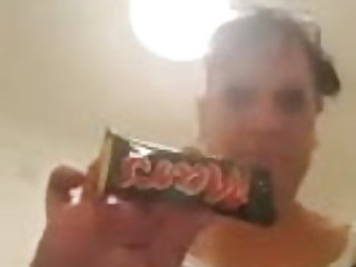 Eating Mars bar with pussy