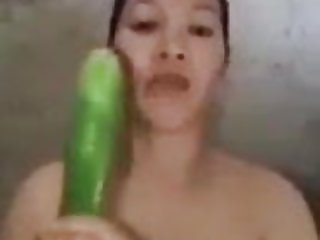 Filipina bitch with cucumber