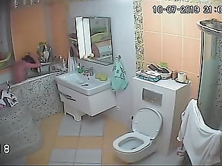 Wife taking a bath