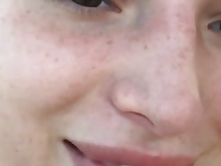 Bella Thorne selfie close-up on her pretty freckled face