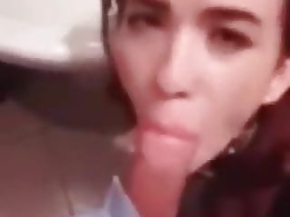 Greek teen gives blowjob in bar toilet, interrupted by stranger
