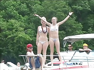 Sexy bikini babes tease guys during a boat ride