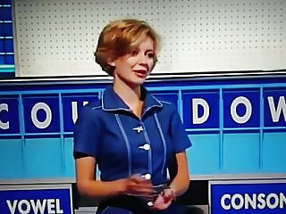 Sexy Quiz host in show stockings top